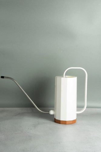 white watering can